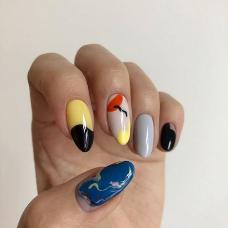 Unusual drawings in manicure for long nails
