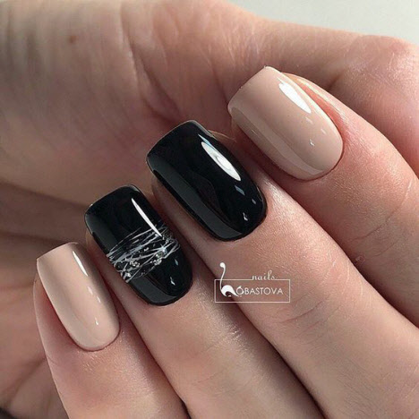 Beige manicure with black