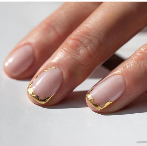 Nude manicure with gold and silver