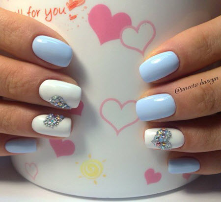 Blue manicure with stones