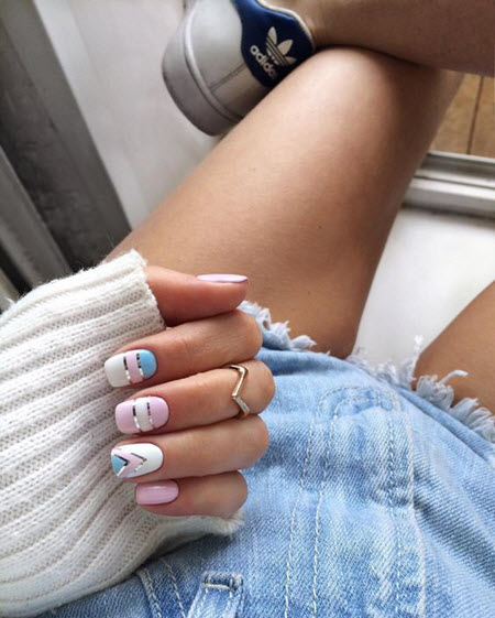 Blue manicure with stripes
