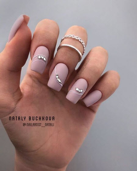 Chic manicure with stones and rhinestones