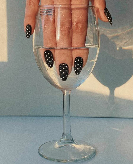 Fashionable and stylish manicure with dots