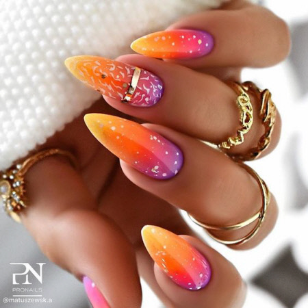 Bright manicure with sparkles and rhinestones