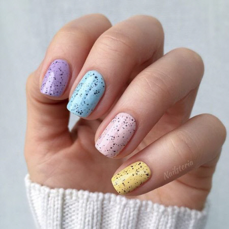 Photo of multi-colored manicure for short nails