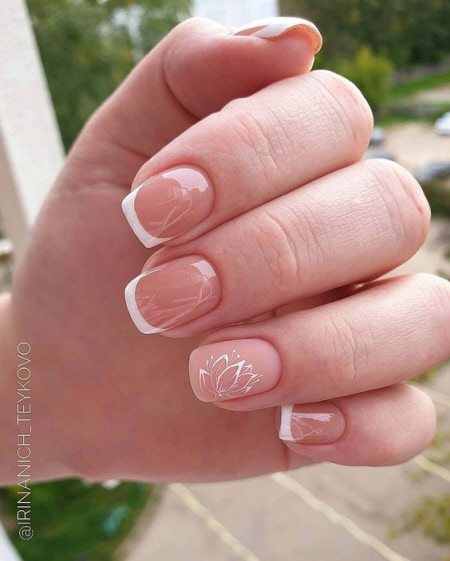 Photo of a beautiful and delicate French manicure